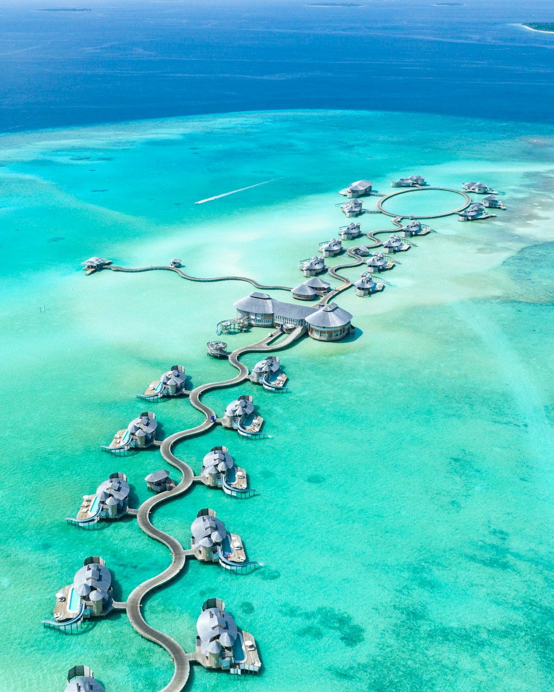 Maldives overwater villas and turquoise lagoon