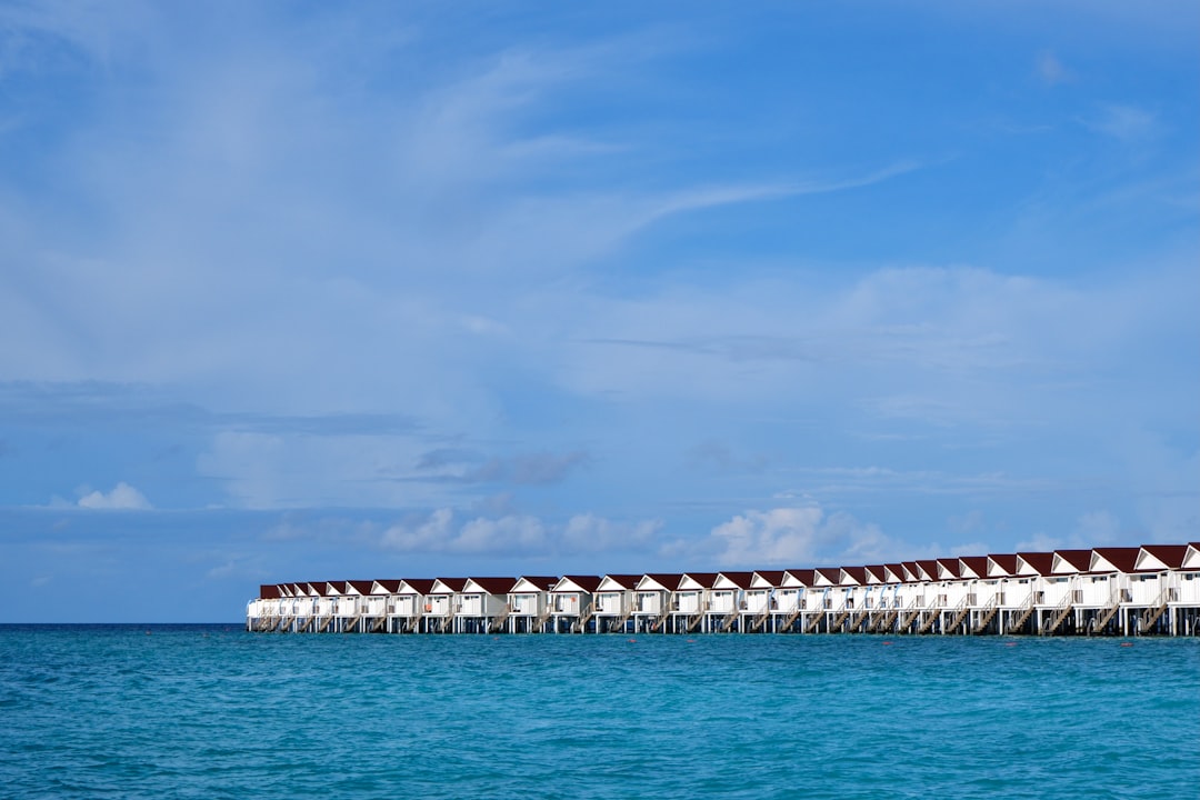 Maldives overwater villas and turquoise lagoon for Maldives holiday packages